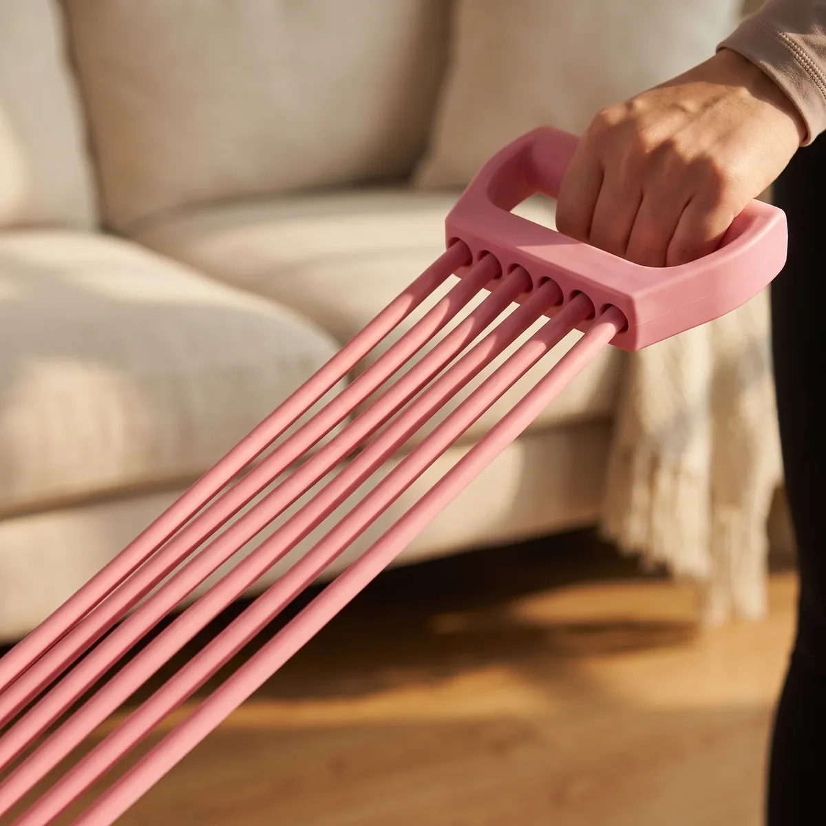 The six rubber tubes meeting a handle, close up